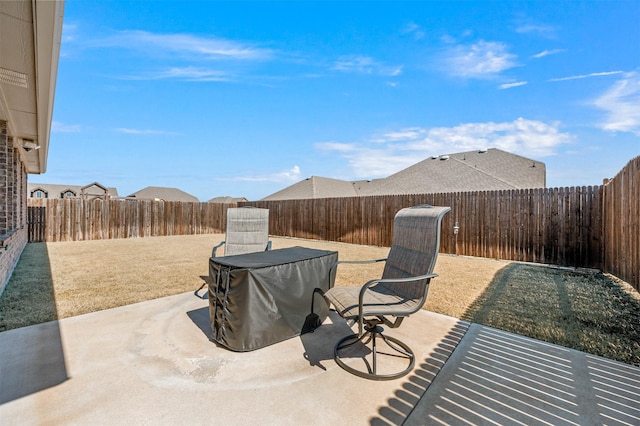 view of patio with a fenced backyard