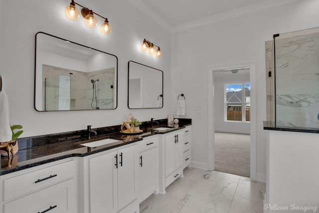 bathroom featuring double vanity, tiled shower, a sink, and marble finish floor