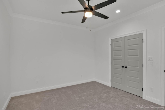 spare room featuring a ceiling fan, baseboards, recessed lighting, and carpet