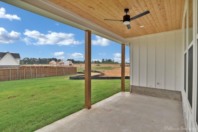 view of patio / terrace featuring fence and ceiling fan