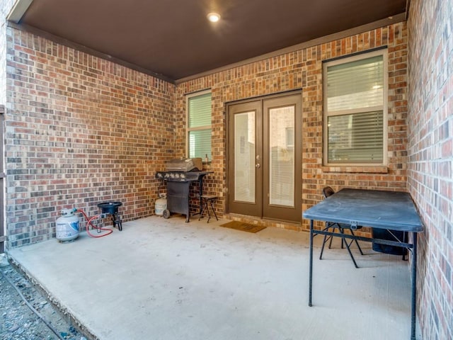 view of patio / terrace with french doors and a grill