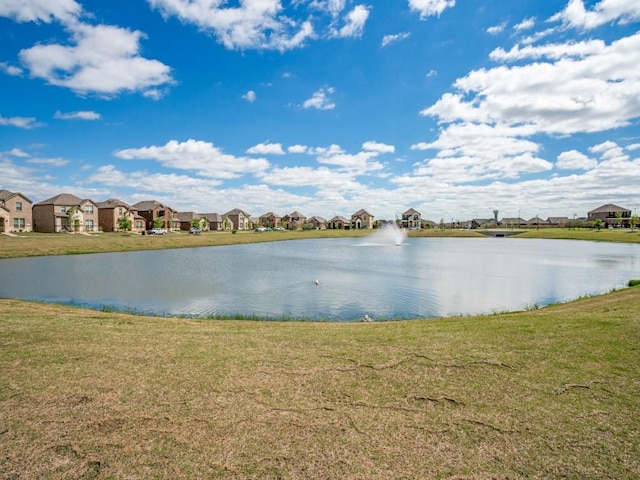 view of water feature with a residential view