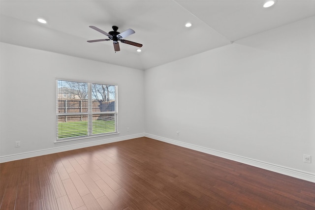 empty room featuring ceiling fan, dark wood-style flooring, recessed lighting, and baseboards