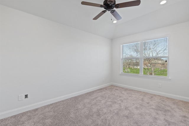 empty room featuring baseboards, lofted ceiling, ceiling fan, carpet, and recessed lighting