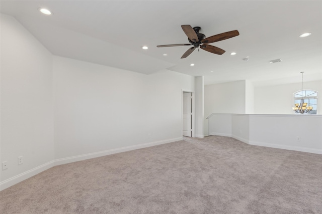 spare room with recessed lighting, visible vents, and baseboards