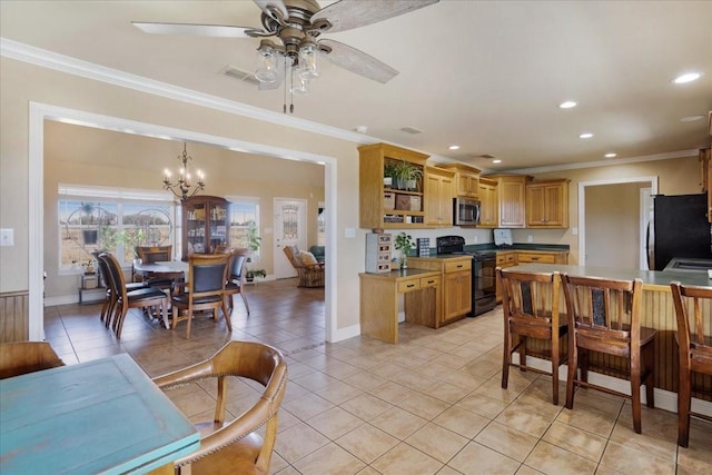 kitchen featuring freestanding refrigerator, open shelves, stainless steel microwave, black gas range oven, and crown molding