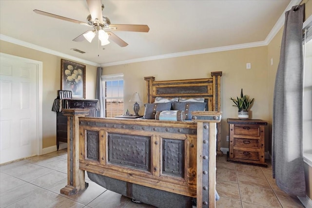 bedroom featuring light tile patterned floors, baseboards, visible vents, and ornamental molding