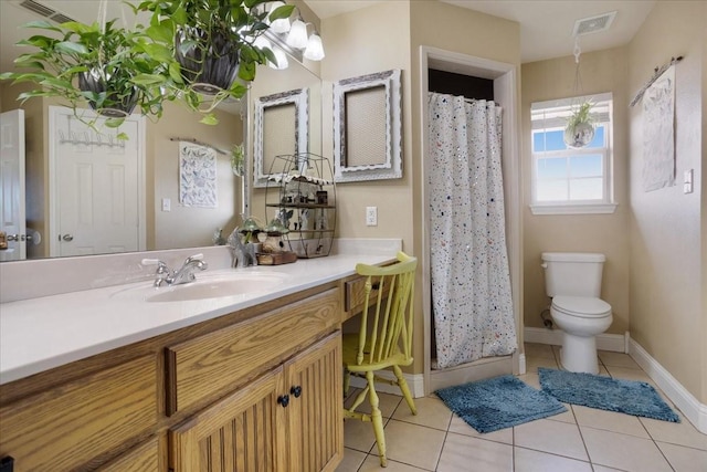 bathroom featuring a shower with shower curtain, vanity, toilet, and tile patterned floors