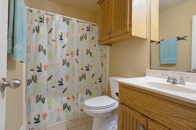 bathroom featuring tile patterned flooring, a shower with shower curtain, vanity, and toilet