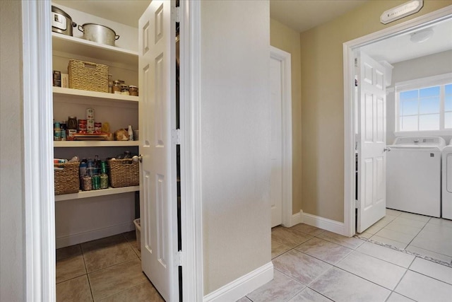 pantry with washing machine and dryer