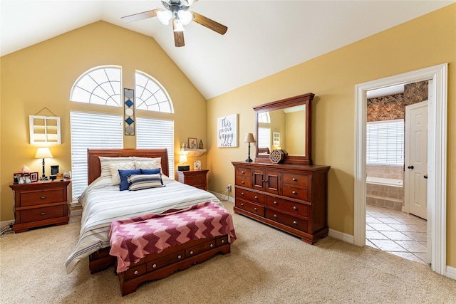 3630 Darnell Dr, Paris, TX 75462 - carpeted bedroom featuring lofted ceiling, ensuite bath, baseboards, and a ceiling fan