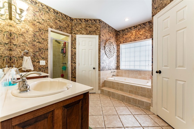 3630 Darnell Dr, Paris, TX 75462 - bathroom featuring tile patterned floors, a shower stall, a bath, wallpapered walls, and vanity