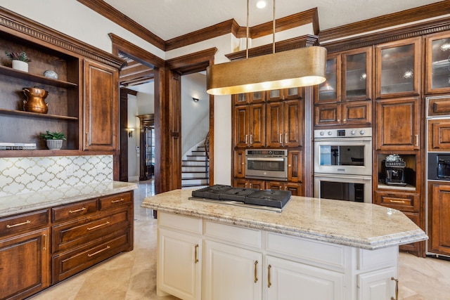 kitchen with open shelves, stainless steel appliances, light stone countertops, and backsplash