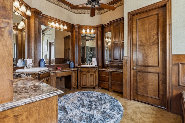 bathroom featuring vanity and ceiling fan