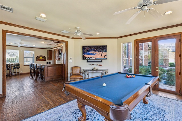 game room featuring wood finished floors, visible vents, baseboards, french doors, and crown molding