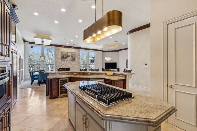 interior space featuring baseboards, marble finish floor, ornamental molding, and an inviting chandelier