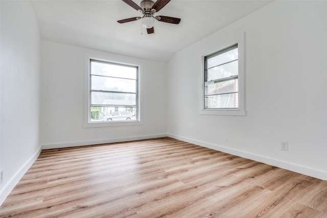 empty room featuring ceiling fan, wood finished floors, and baseboards