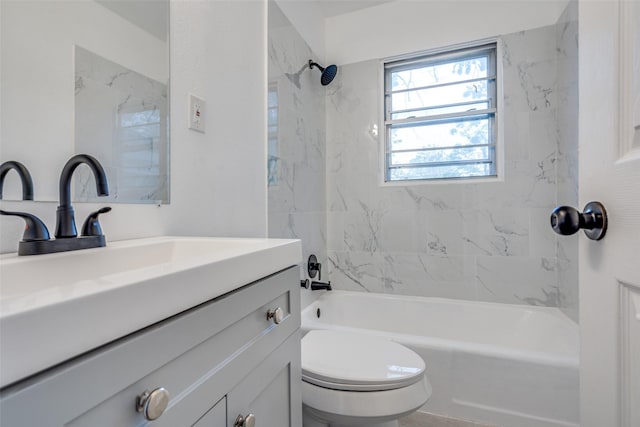 bathroom with vanity, toilet, and shower / bathtub combination