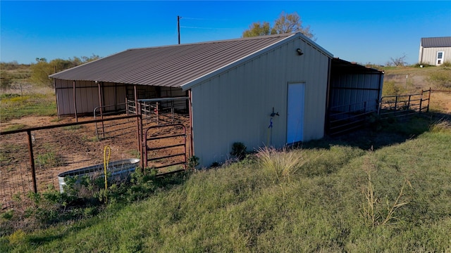 view of outbuilding featuring an exterior structure and an outdoor structure