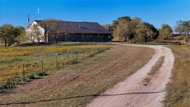 view of road featuring driveway