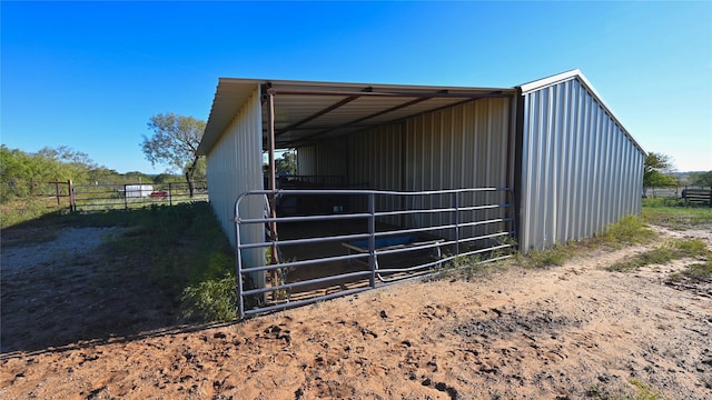 view of outbuilding featuring an outbuilding and an exterior structure