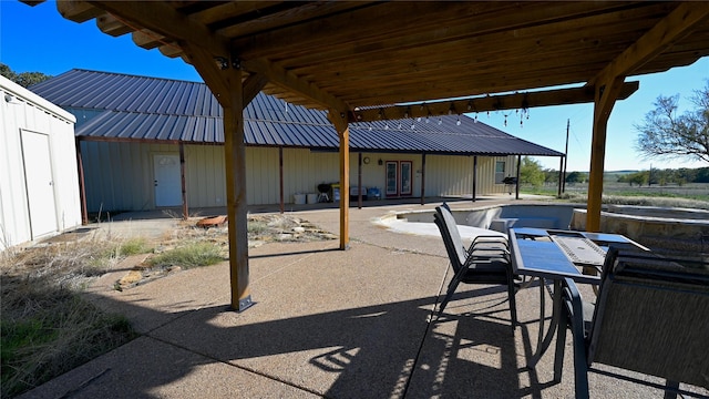 view of patio / terrace featuring an outdoor pool