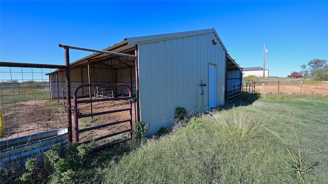 view of outbuilding with an outbuilding and an exterior structure