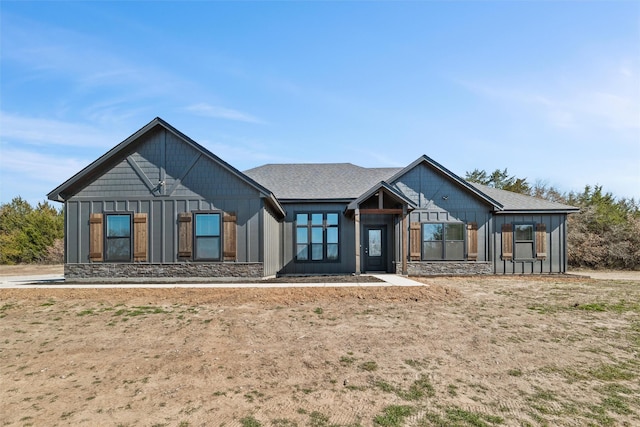 modern inspired farmhouse featuring board and batten siding