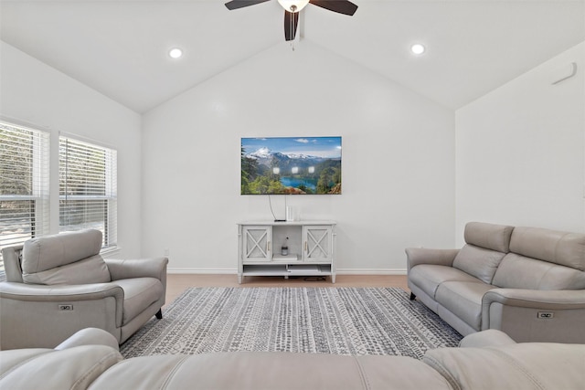 living room featuring lofted ceiling with beams, baseboards, recessed lighting, and a ceiling fan