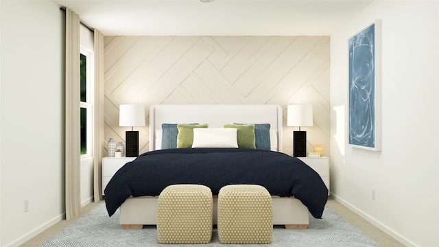 carpeted bedroom with baseboards