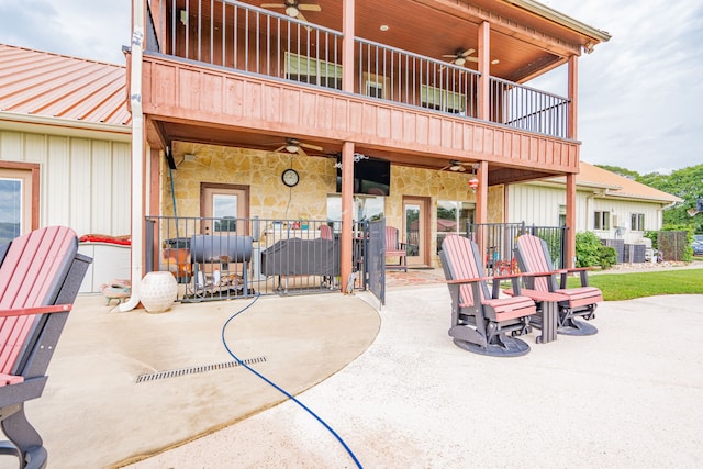 view of patio / terrace featuring a balcony and ceiling fan