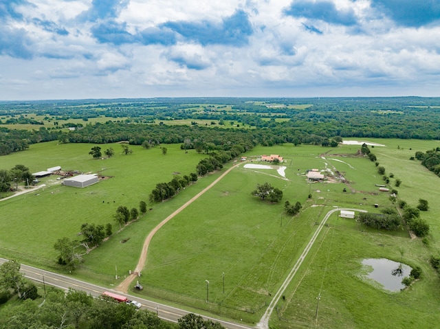 birds eye view of property featuring a rural view