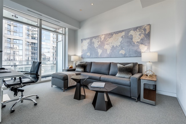 living room with carpet floors and baseboards