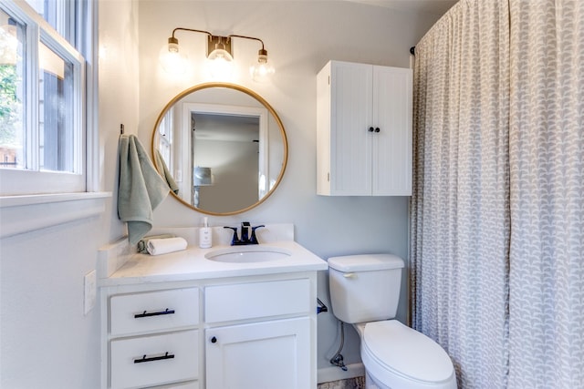 full bath with vanity and toilet