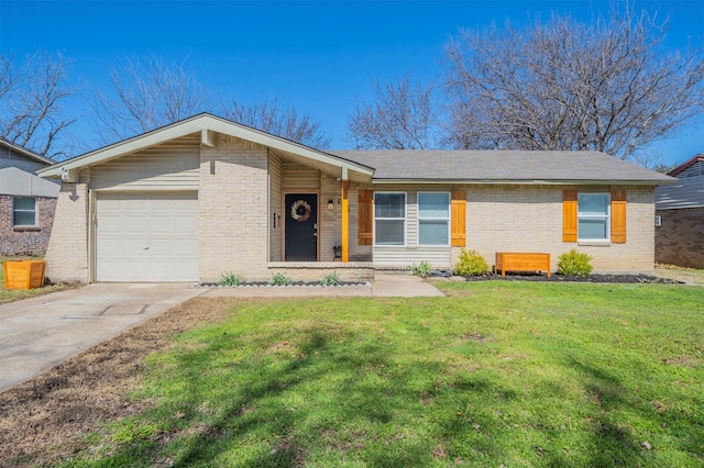 view of front of house with an attached garage, a front lawn, concrete driveway, and brick siding