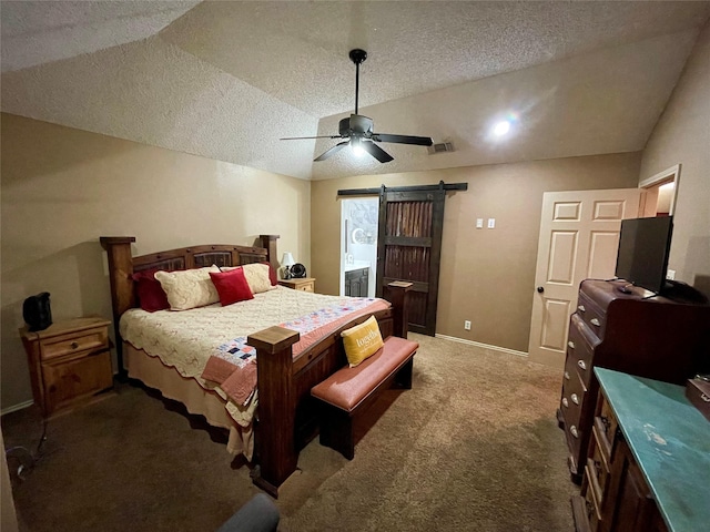 carpeted bedroom with lofted ceiling, a barn door, a textured ceiling, and visible vents