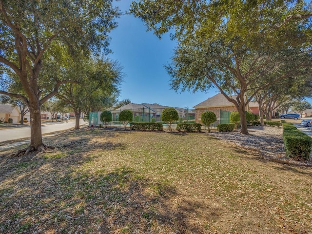 view of front of house with fence