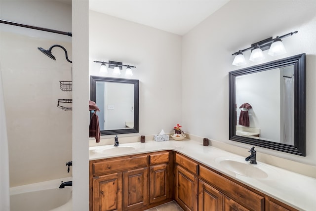 bathroom with double vanity and a sink