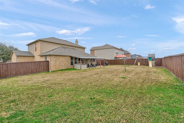 view of yard with a patio area and a fenced backyard