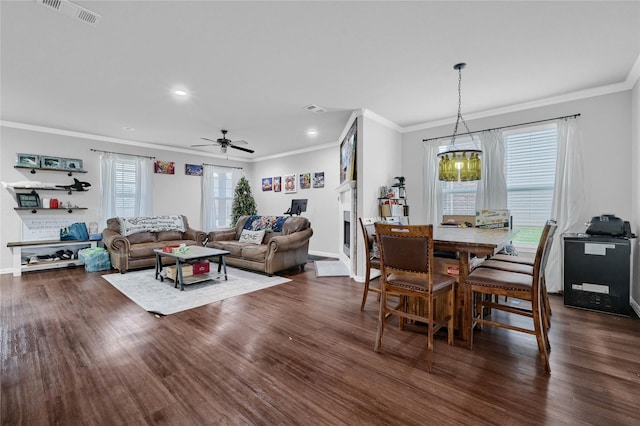 dining space featuring dark wood-style floors and visible vents