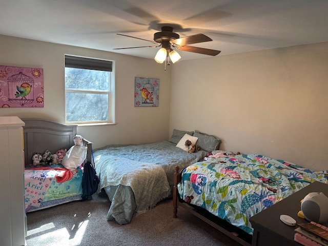 bedroom with carpet flooring and a ceiling fan