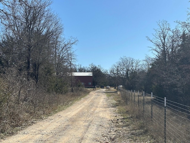 view of road with driveway