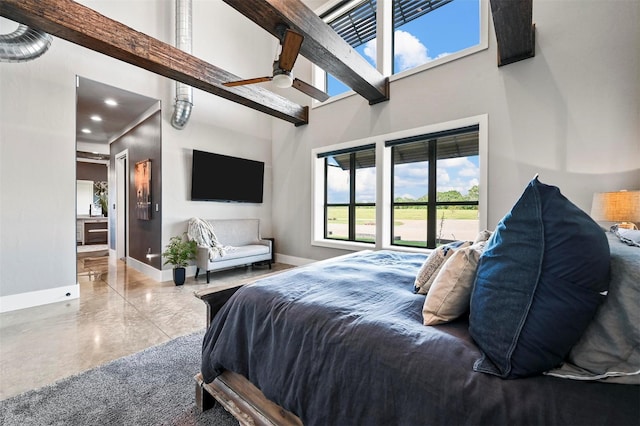 bedroom featuring a ceiling fan, recessed lighting, a towering ceiling, and baseboards