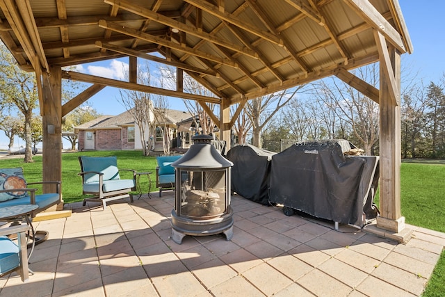 view of patio with a gazebo and a grill