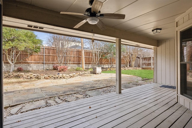 wooden deck featuring a patio area, a fenced backyard, and ceiling fan