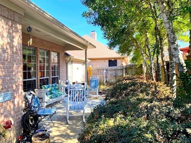 608 Paloma St, Tyler, TX 75703 - view of patio with fence