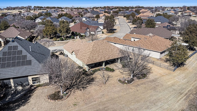 birds eye view of property with a residential view