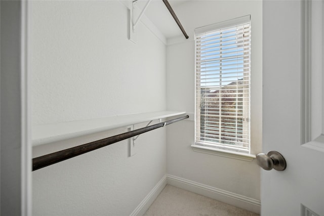 walk in closet with visible vents