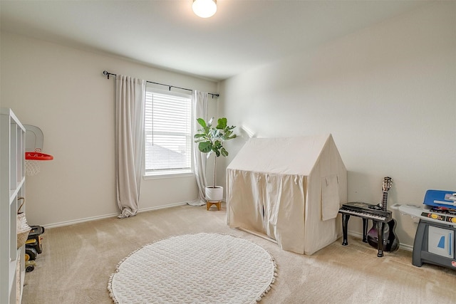 interior space featuring baseboards and carpet flooring