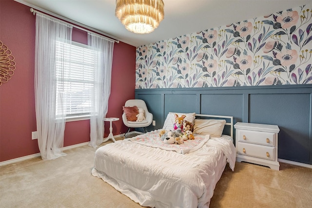 bedroom featuring wainscoting and carpet flooring